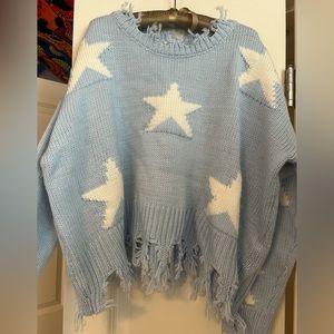 Storia blue and white star sweater, size medium.